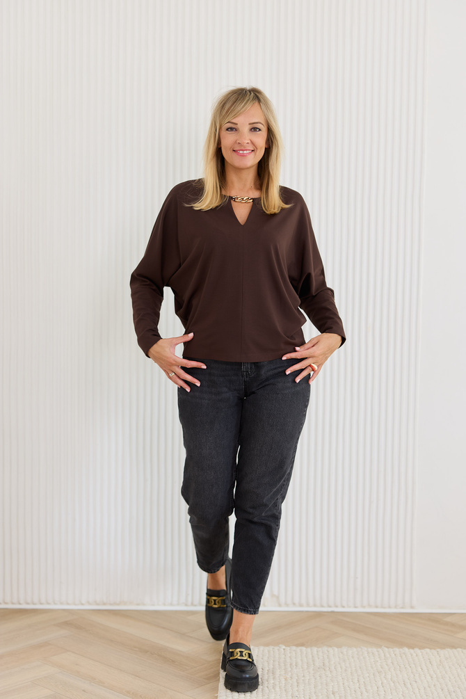 Chocolate blouse with a decorative chain