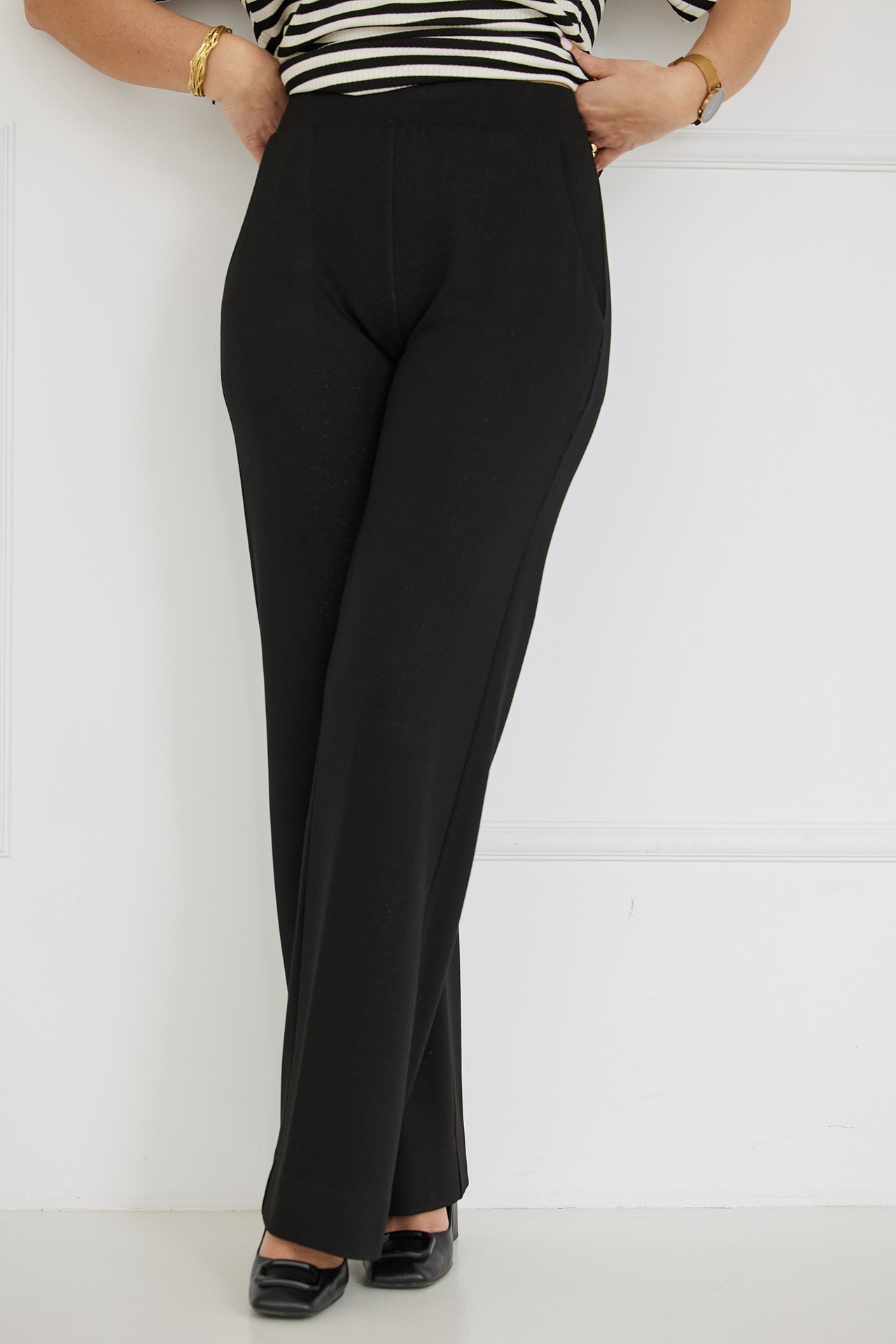 Eleganckie rozszerzane spodnie wzór jodełka