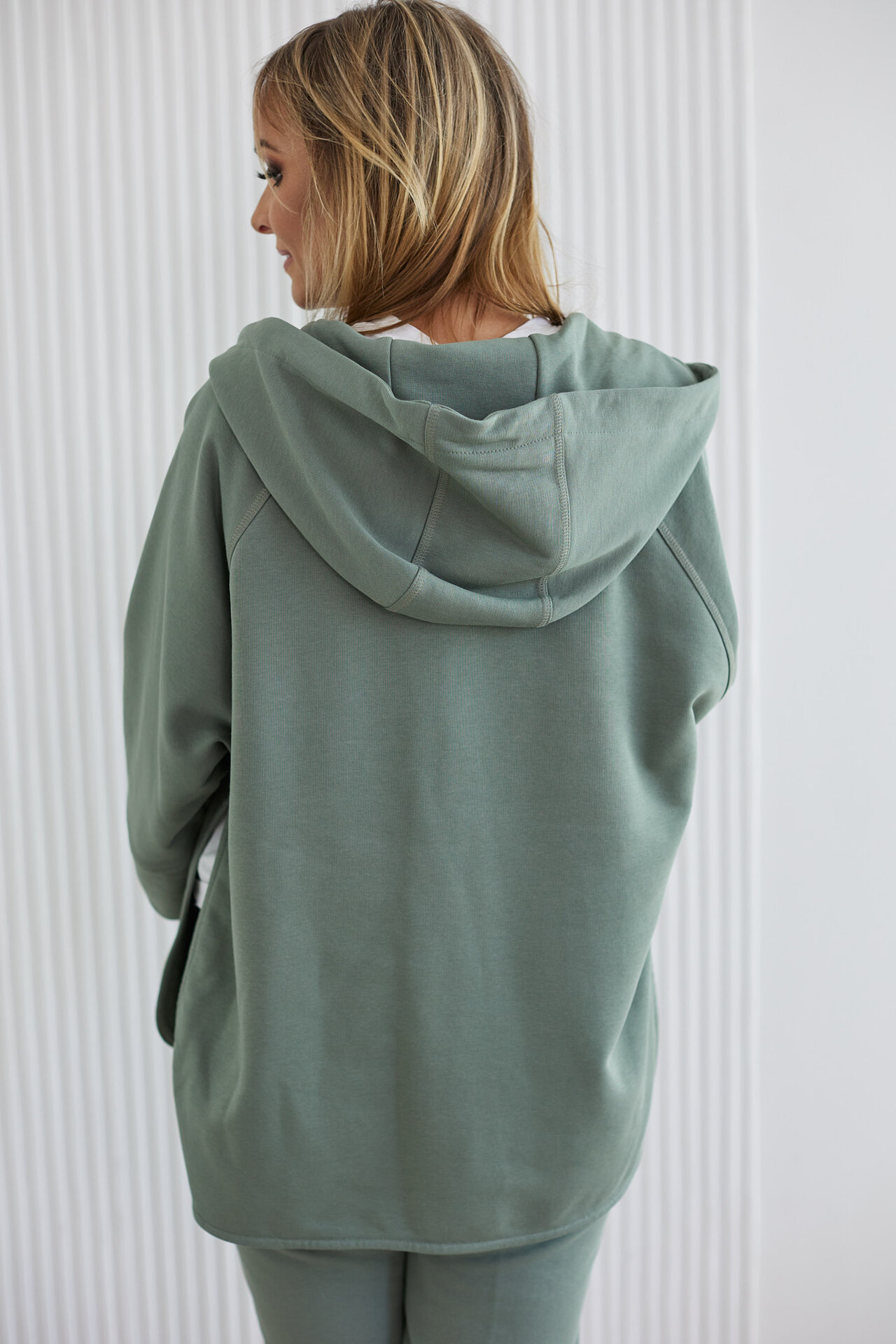 Olive-colored zip-up hoodie