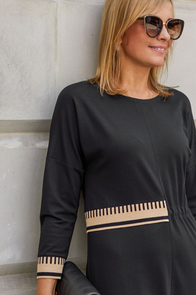 Formal black dress made of elastic fabric