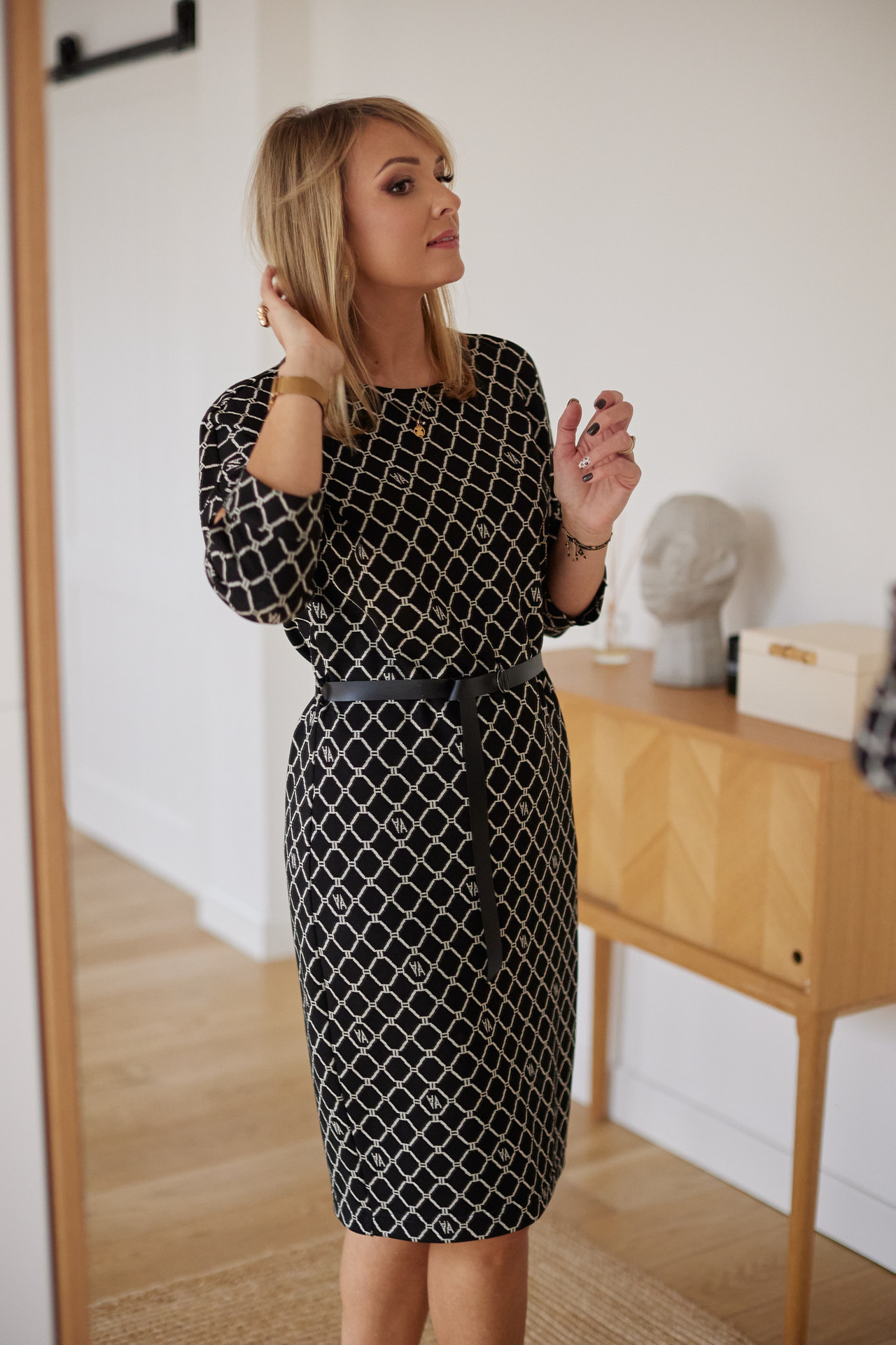 Knitted dress with a belt in a jacquard pattern with lurex