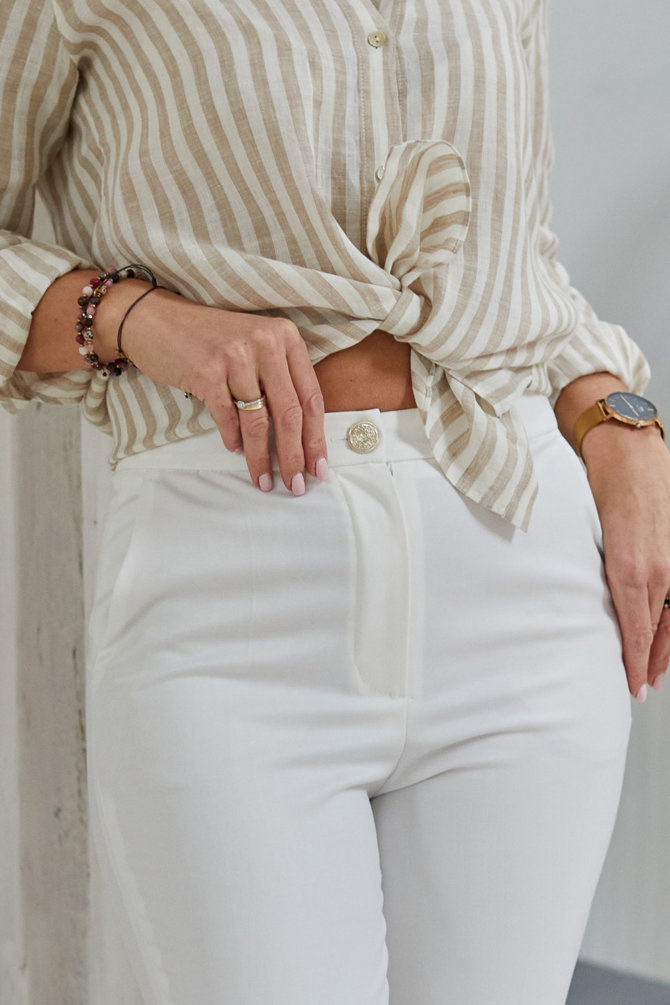 Elegant, ecru trousers with a classic cut