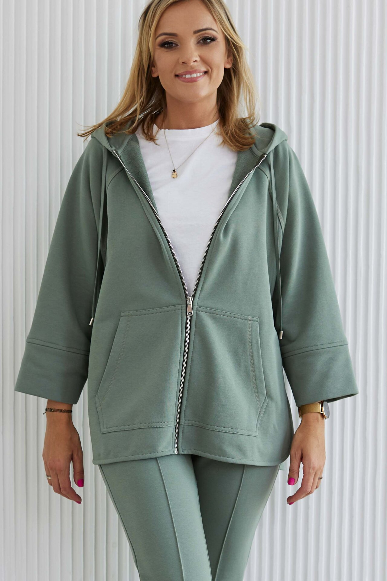 Olive-colored zip-up hoodie