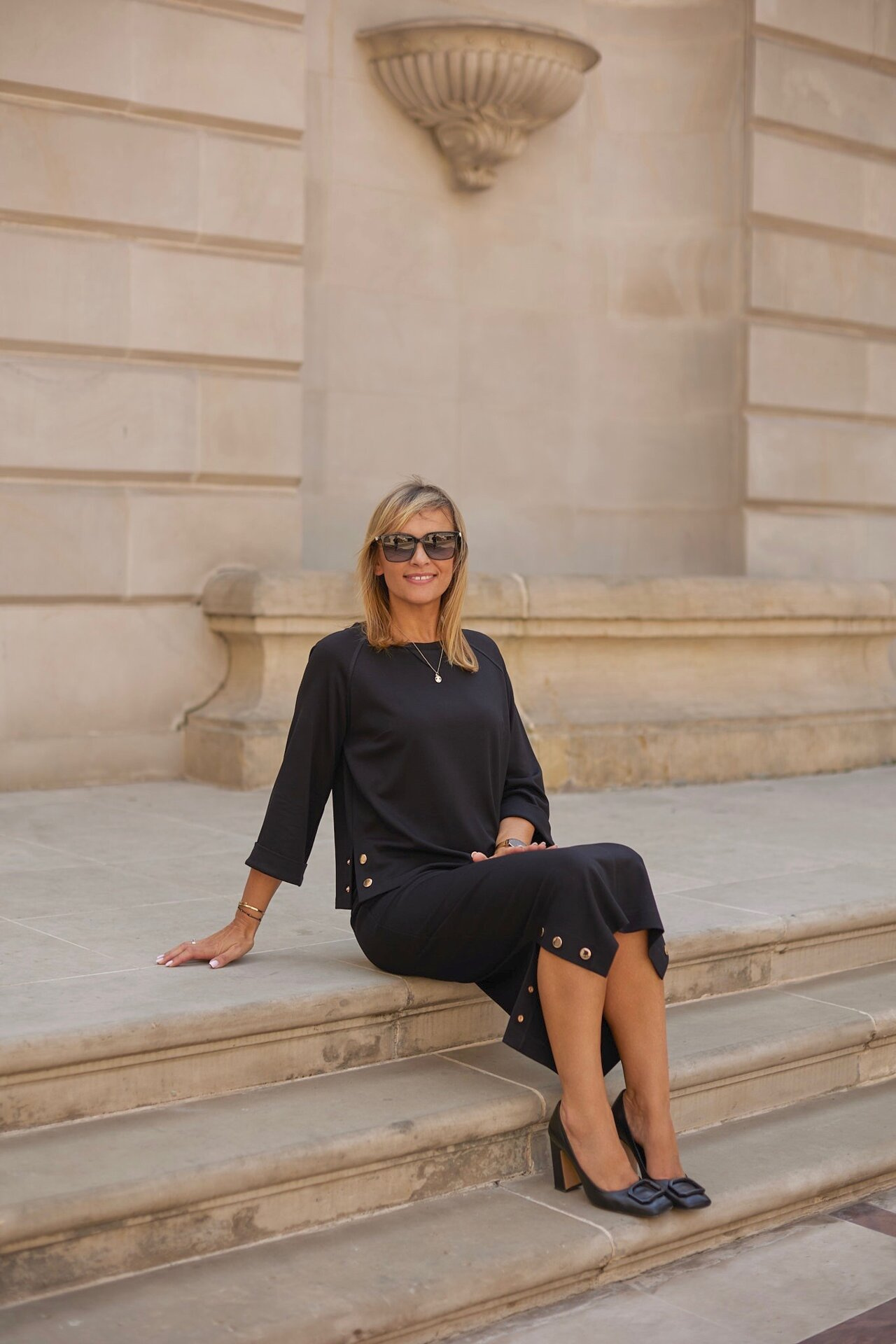 Black elegant set with metal snaps (blouse + skirt)