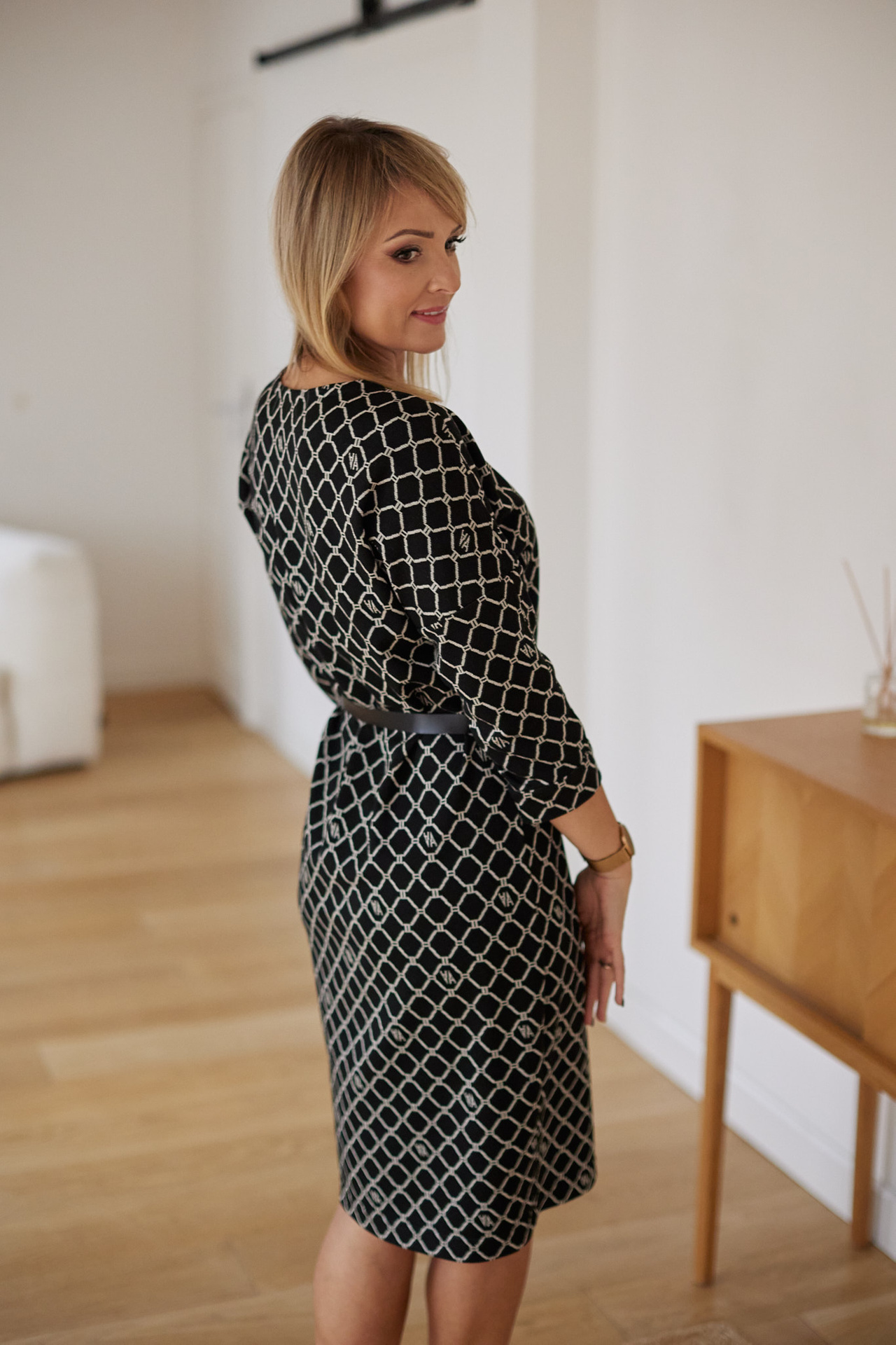 Knitted dress with a belt in a jacquard pattern with lurex